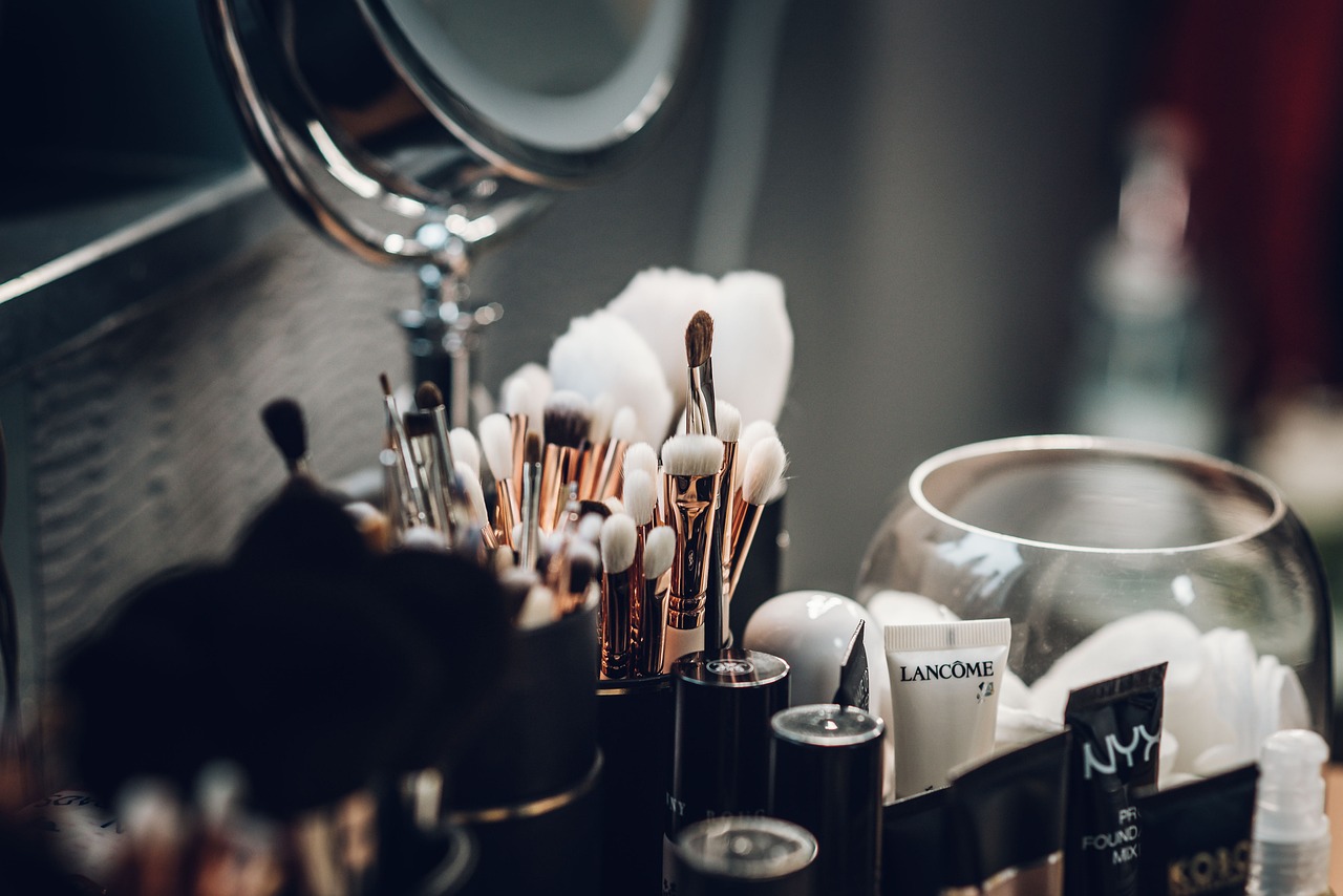 A collection of beauty products including makeup and cosmetics